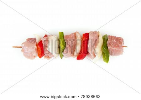 Shashlik with bacon, paprika, onion