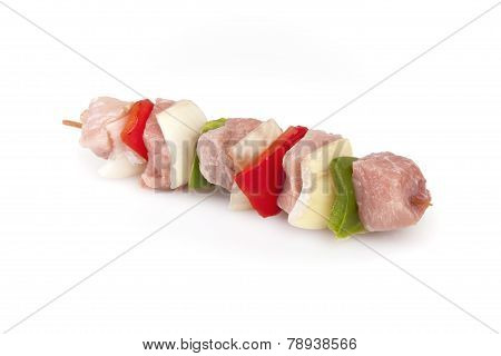 Shashlik with bacon, paprika, onion