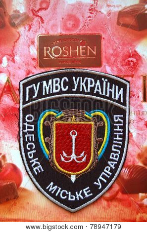 Illustrative editorial. Chevron of Ukrainian Police in Odessa Region.With logo Roshen Inc. Trademark Roshen is property of ukrainian president Poroshenko.At December 20,2014 in Kiev, Ukraine