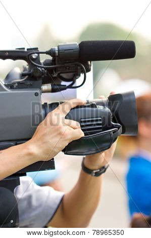 Close Up Of Cameraman.