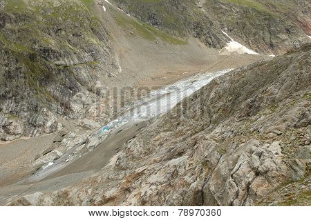 Rocks And Glacier In Alps In Switzerland