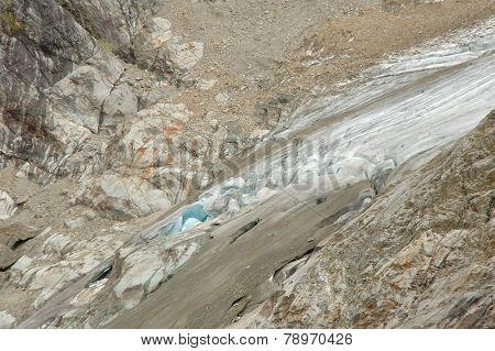 Rocks And Glacier In Alps In Switzerland