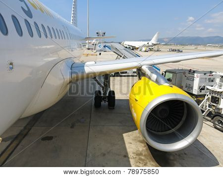 Plaine Receiving Fuel From Tanker Truck
