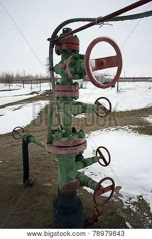 The mouth of the oil wells on the valve and pump.