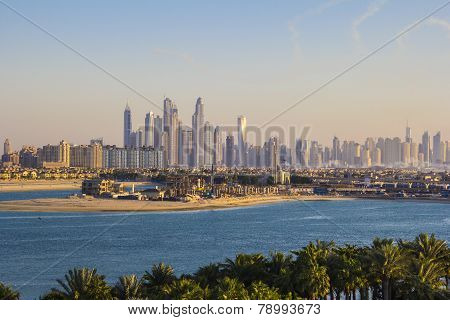 view of the group of skyscrapers of Dubai Marina with the Palm