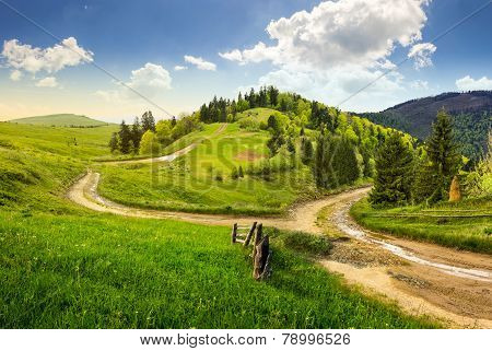 Cross Road On Hillside Meadow In Mountain