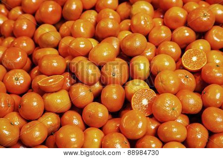 Pile Of Organic Tangerines At Market Stall