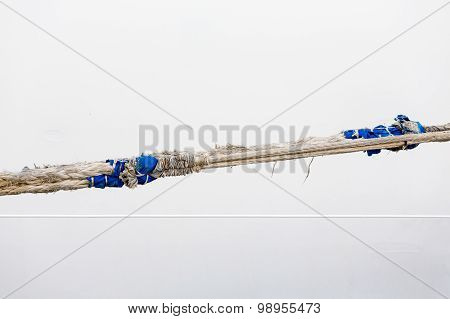 White And Blue Rope Against White Bulkhead