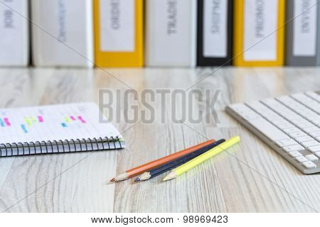 Side view on the working place of manager