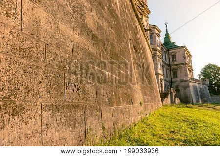 Medieval Pidhirtsi Castle in sunset summer light, Pidhirtsi village, Lviv region, Ukraine≠