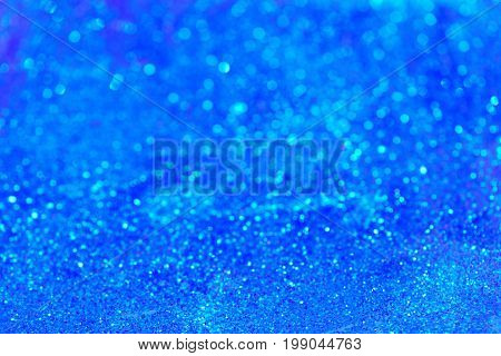 golden glitter texture Colorfull Blurred abstract background for birthday anniversary wedding new year eve or Christmas.