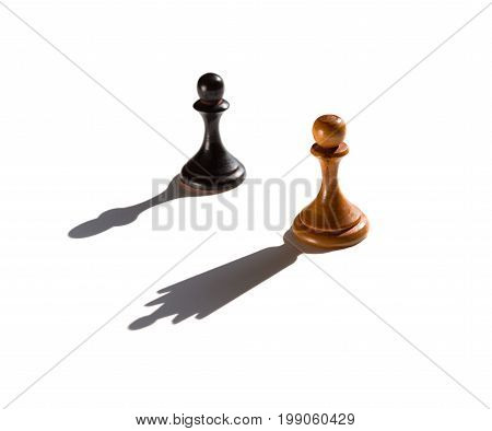 two chess pawns one casting a queen piece shadow concept of strength and aspirations