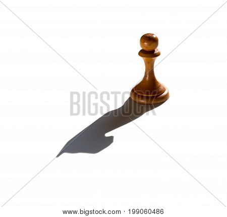 a chess pawn casting a knight piece shadow concept of strength and aspirations