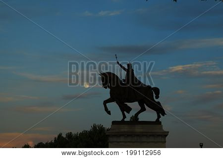 July 7 2017 - St. Louis Missouri - The sunset over the Apotheosis of St. Louis statue of King Louis IX of France namesake of St. Louis Missouri in Forest Park St. Louis Missouri.