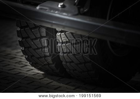 Heavy Duty Truck Tires Closeup Photo. Semi Truck Wheels