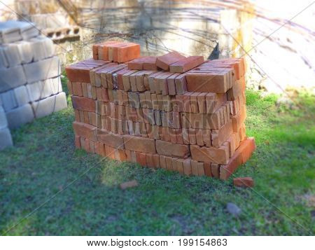 Pile of bricks. Construction bricks sorted. Bricks heap