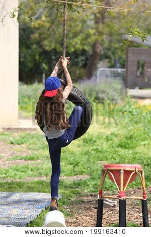Children ride on impromptu swings
