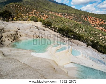 Baishuitai White Water Terraces travel destination near Zhongdian in Yunnan China