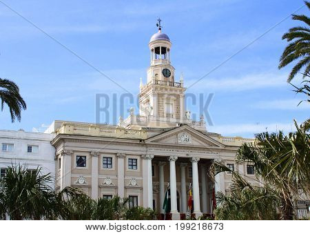 Cathedral tower in the blue sky. Cadiz.