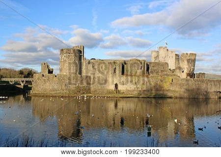 Caerphilly castle reflected in the lake, Wales
