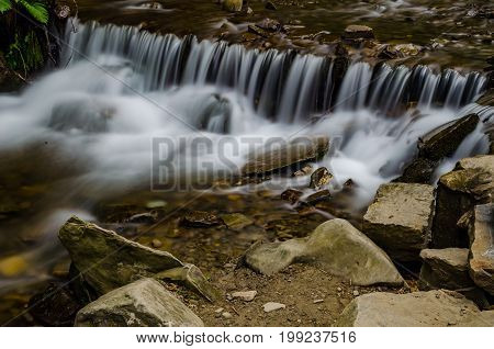 Landscape Of Waterfall Shypit In The Ukrainian Carpathian Mountains On The Long Exposure