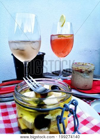 Wine and snacks on a summer evening.