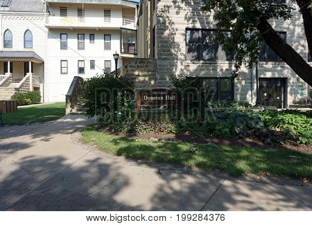 JOLIET, ILLINOIS / UNITED STATES - JULY 17, 2017: A sign marks the entrance to Donovan Hall at the University of Saint Francis.
