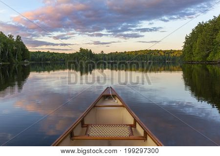 Bow Of A Canoe On A Lake In Ontario, Canada