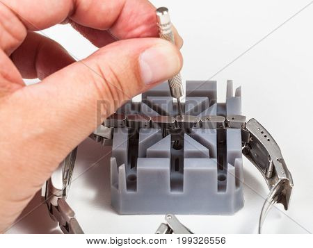 Adjusting Of Watchband With Punch Pin