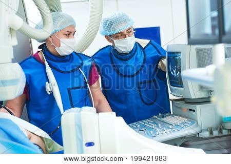 andiography and ultrasound surgeon at surgery operating room