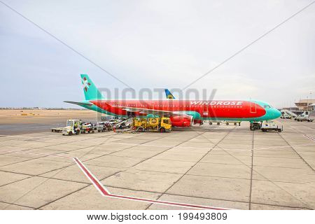 Sharm El Sheikh, Egypt - April 13, 2017: The loose luggage being loaded into narrow body aircraft at day at Sharm El Sheikh, Egypt on April 14, 2017