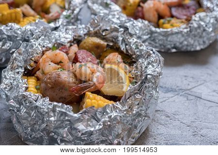 Homemade Traditional Cajun Shrimp Boil with Sausage Potato and Corn foil pack