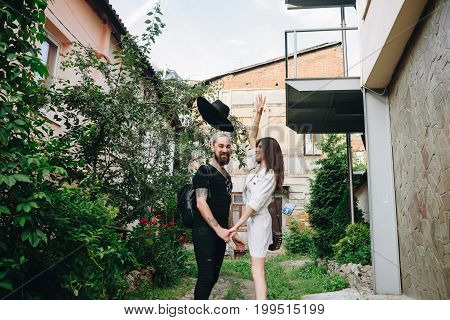 Man And Woman Or Young Couple Making A Trip As Tourists In City.