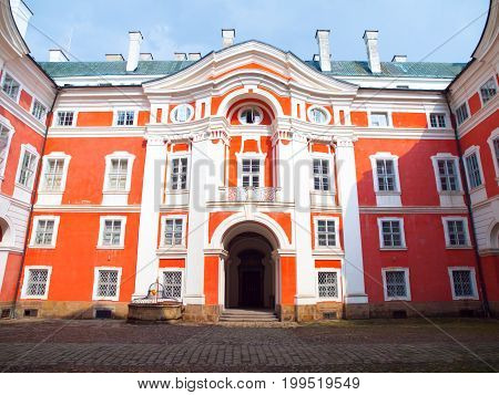 Benedictine Monastery in Broumov. Main courtyard with entrance gate. Czech Republic.