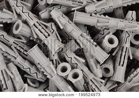 Some new gray plastic dowel close up