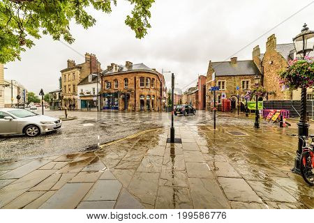 Northampton, UK - Aug 08, 2017: Cloudy rainy day view of Northampton Town Centre Streets.
