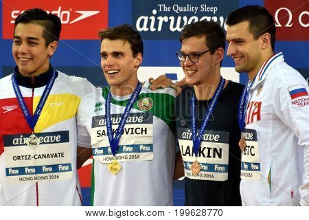 Hong Kong China - Oct 30 2016. ORTIZ-CANAVATE Miguel (ESP) SANKOVICH Pavel (BLR) LARKIN Mitch (AUS) and DONETC Stanislav (RUS) at the Victory Ceremony of Men`s Backstroke 50m. Swimming World Cup