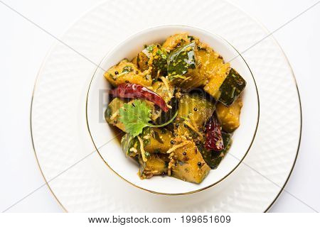 Popular indian main course vegetable Pumpkin dry curry or kaddooor kaddu ki sabzi in hindi, lal bhopla chi bhaji in marathi, selective focus