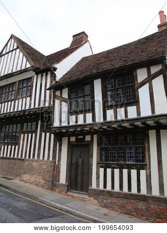 Old house on a road in England