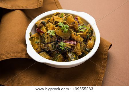 Popular indian main course vegetable Pumpkin dry curry or kaddooor kaddu ki sabzi in hindi, lal bhopla chi bhaji in marathi, selective focus