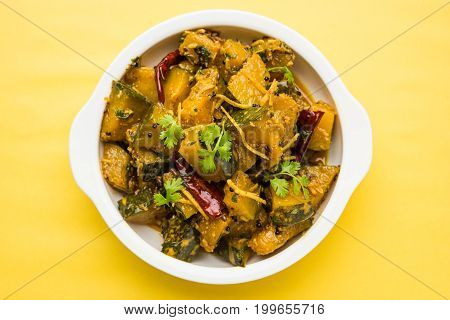 Popular indian main course vegetable Pumpkin dry curry or kaddooor kaddu ki sabzi in hindi, lal bhopla chi bhaji in marathi, selective focus