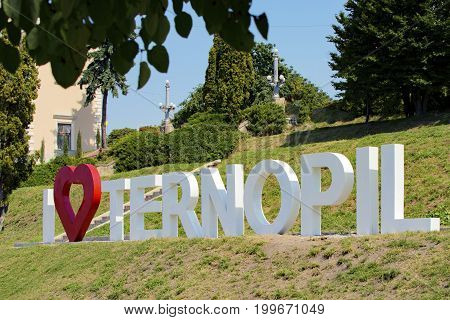 TERNOPIL, UKRAINE - AUGUST 11, 2017: Inscription from the metal letters I Love Ternopil set August 01, 2017 on the embankment of the Ternopil lake