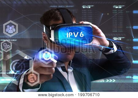 Business, Technology, Internet And Network Concept. Young Businessman Working In Virtual Reality Gla
