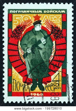 USSR - CIRCA 1968: A stamp printed in USSR issued for the 50th anniversary of Soviet Frontier Guards shows Frontier Guard, circa 1968.