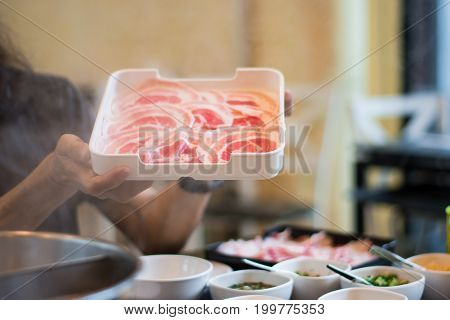Raw Sliced Beef for Shabu Shabu. Plate  sliced raw beef for japanese shabus habu