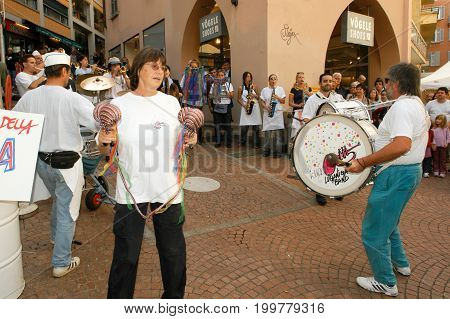 People Performing Gugge Music At The Carnival Of Lugano