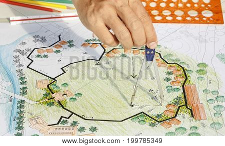 Landscape Architect Designing on site analysis plan .
