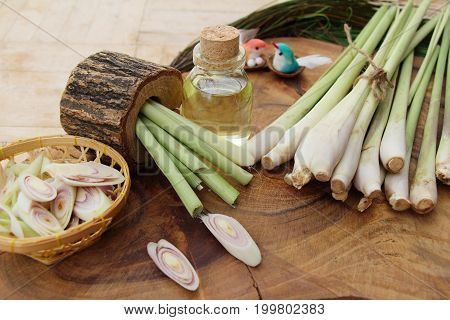 Lemongrass essential oil with fresh slice lemongrass