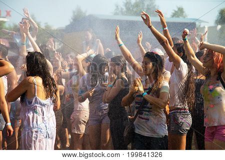 Odessa, Ukraine - August 5, 2017: Water Festival. Party Wet. Hands And Happy People Crowd Partying U