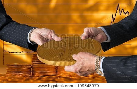 Hands of three financial traders gripping gold eagle coin against a background of rising prices for the currency